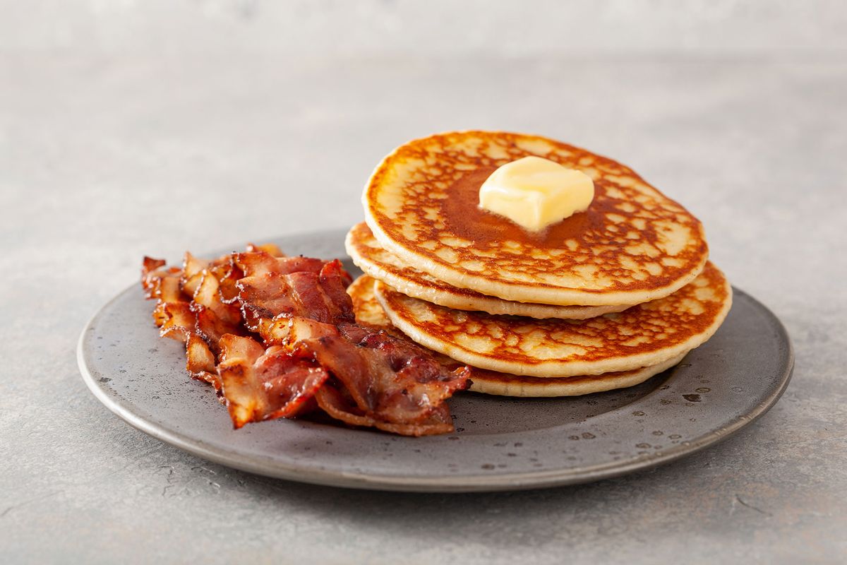 Sweet pancakes with butter and bacon (Getty Images/OlgaMiltsova)