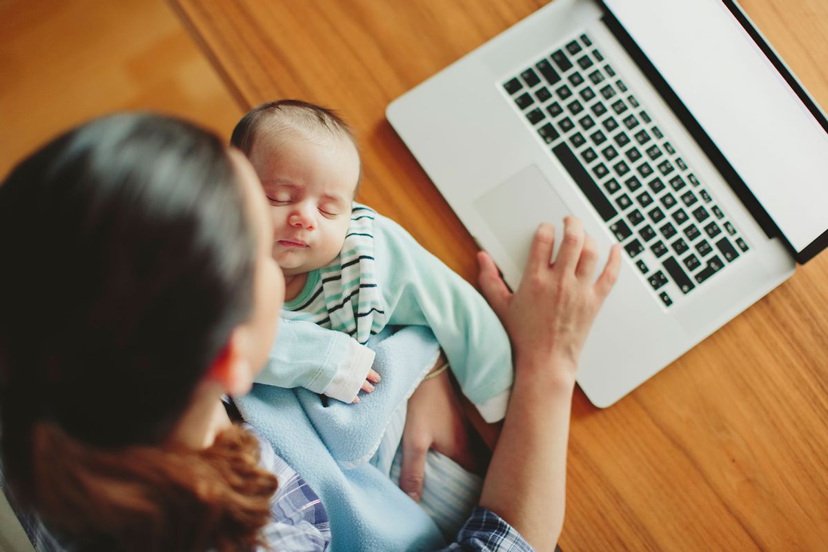 Multi-tasking mum (Getty Images/Thanasis Zovoilis)