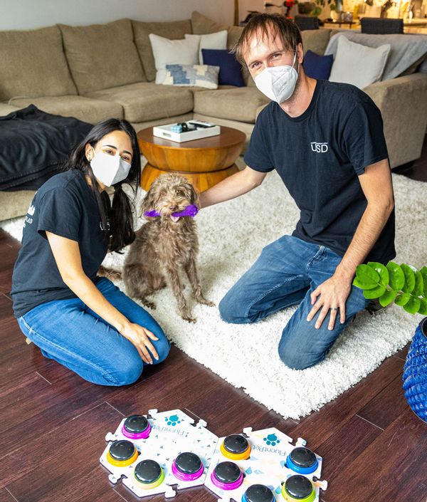 Amalia Bastos and Patrick Wood with dog study subject